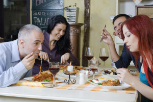 Friends at restaurant have fun | Abroad101 Blog