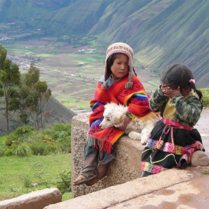 Peru-Lima-ISA-Review_6093_Photo__4af5 | Abroad101 Blog Two Peruvian kids sitting on ancient ruins with the valley in the background.