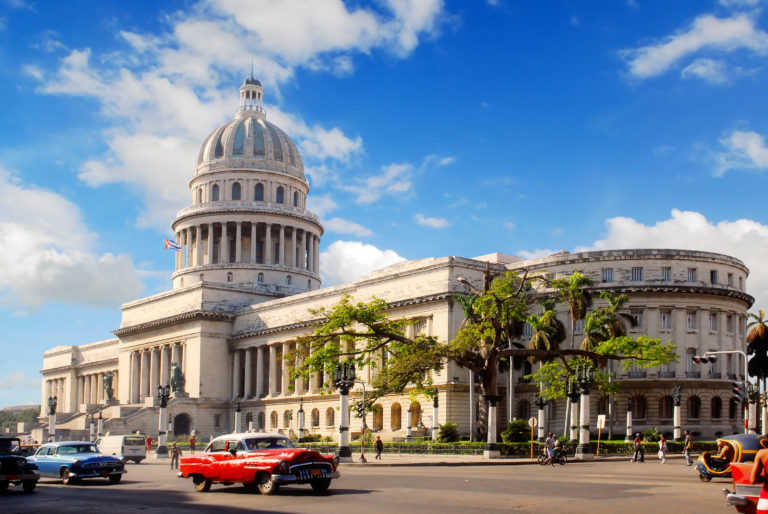 Capitolio building Havana, Cuba with vintage old american cars | Abroad101 Blog