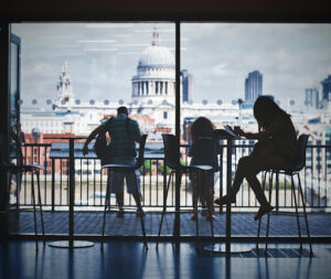 Study Abroad 1 | Abroad101 Blog Three people sitting while watching the Washington DC Capitol.
