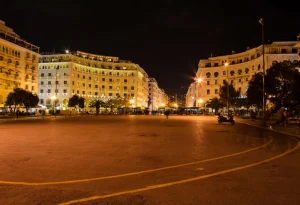 Program_1586_Photo__6e1f 2 | Abroad101 Blog Nighttime panorama of Thessaloniki’s Aristotelous Square, its sweeping neoclassical façades glowing under golden lights.
