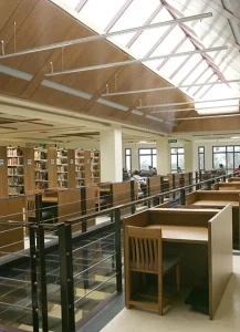 Program_1586_Photo__a8cf 5 | Abroad101 Blog Sun-lit study carrels and book stacks inside ACT’s Bissell Library.