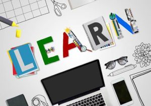 unnamed (5) | Abroad101 Blog Colorful “LEARN” letters with a laptop and study tools, representing digital learning and AI-guided study abroad search.